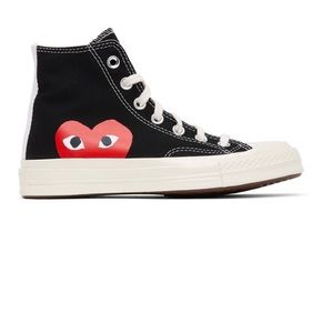 Black comme des garçons. Worn only once. Comes in original box. Size 6 women
